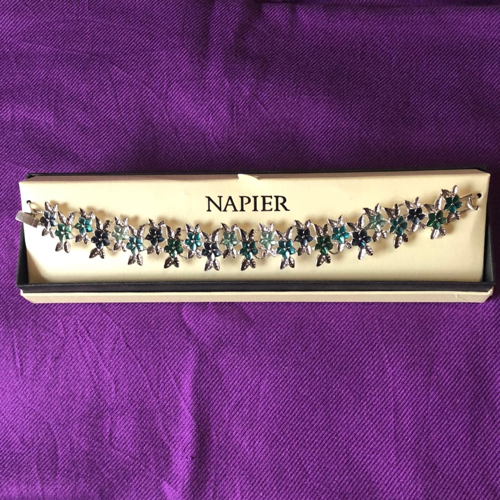 Napier flower bracelet, delicate flowers in shades of teal with silver leaves